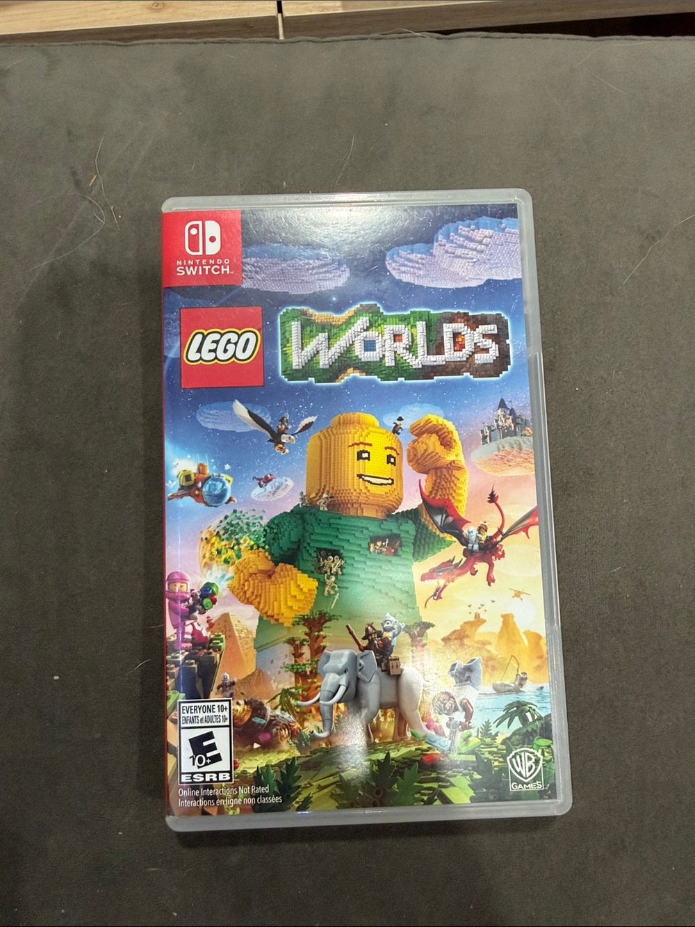 Lego Worlds Nintendo Switch Game — Blue, Green, Yellow, Red, Orange Artwork